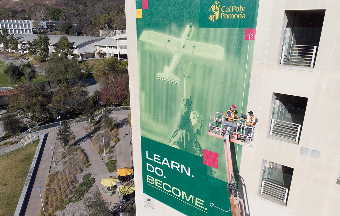 The CLA Classroom Side with the new Become by Doing banner being installed.