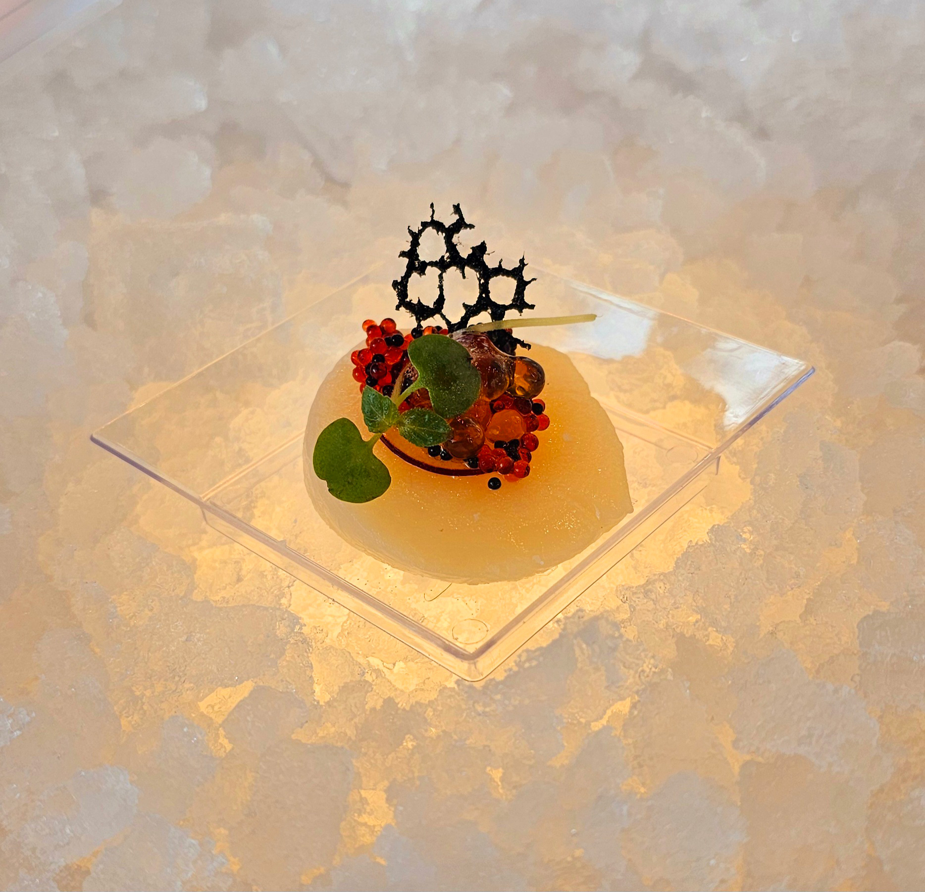 Golden Dragonfruit Blossom with Cucumber, Dragonfruit and honey accented by vanilla, jasmine and edible gold. 