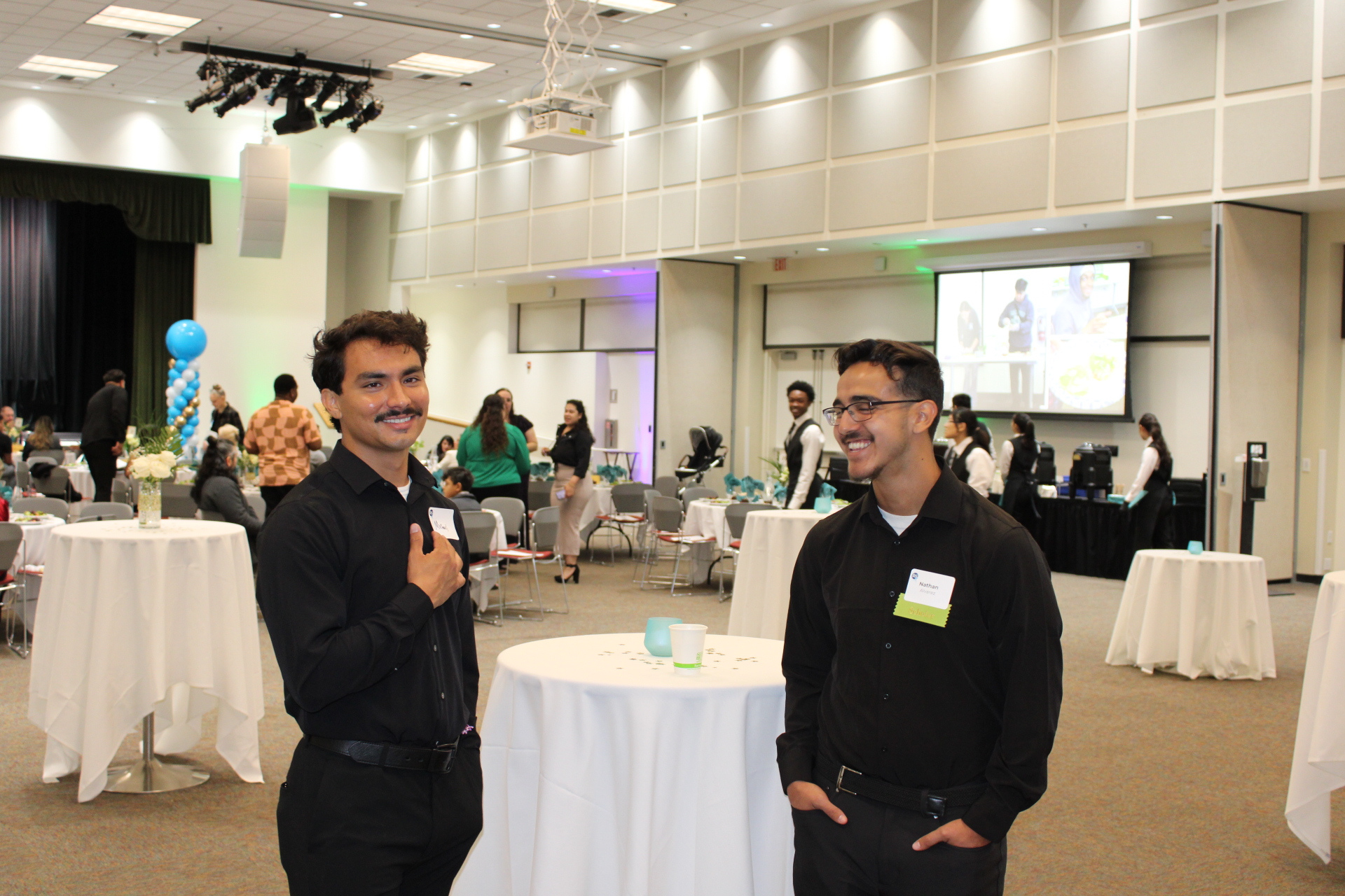 Michael Miser smiles during an event