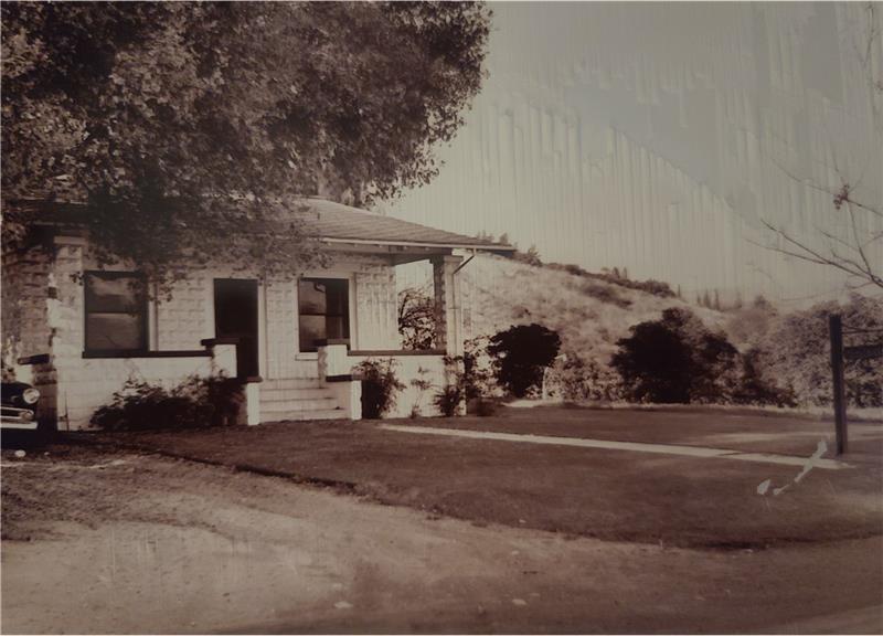 The 4-room Health Center in the 1950's with a 2-bed ward and closed in porch