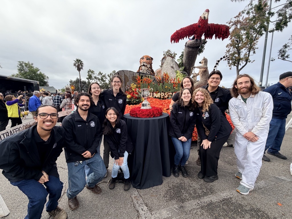The Rose Float team poses with the Sweepstakes Award. 