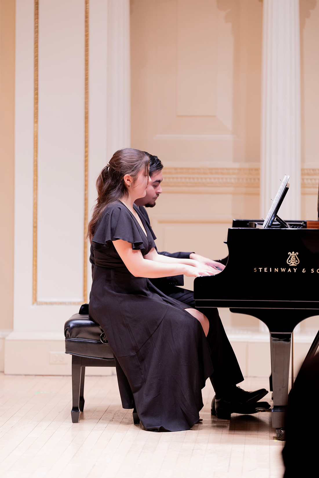Catherine Gruen and Jesse Ortiz perform at Carnegie Hall. 