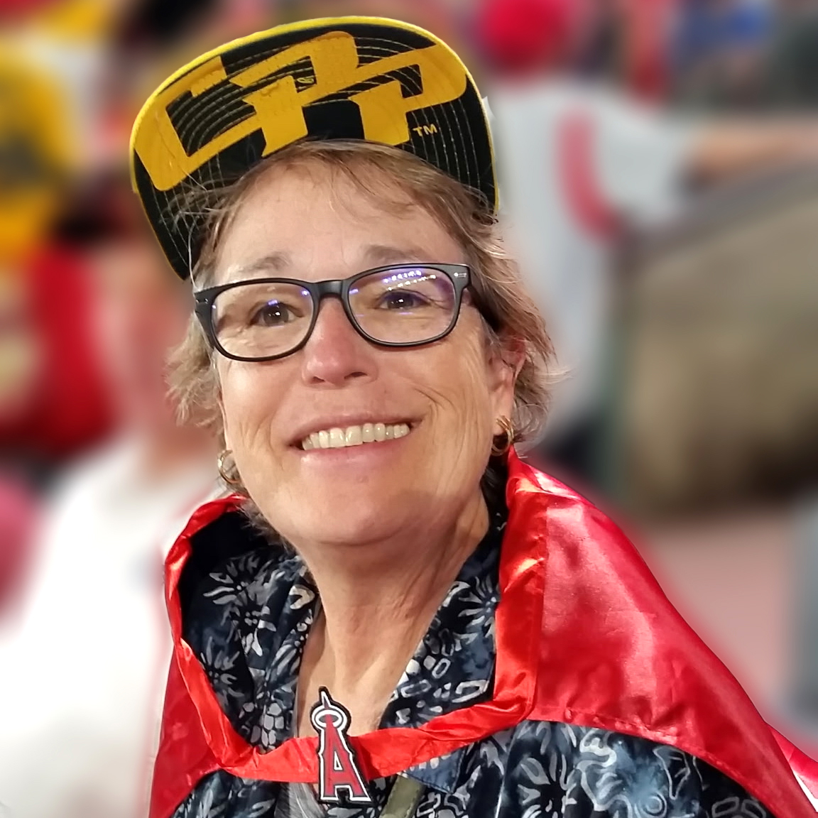 Jane Ballinger at an Angel Game wearing a CPP hat. 
