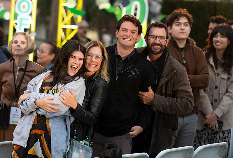 A family celebrates and cheers during the 2026 commencement ceremonies.