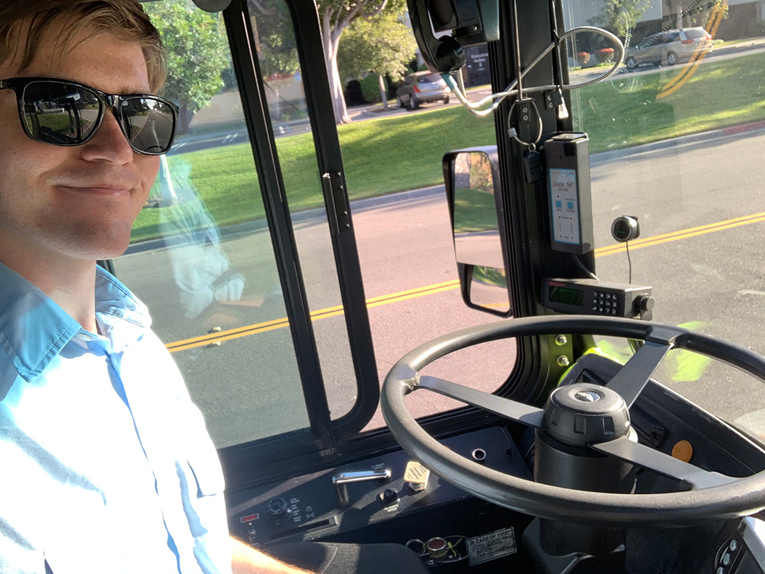 Lucas driving a bus