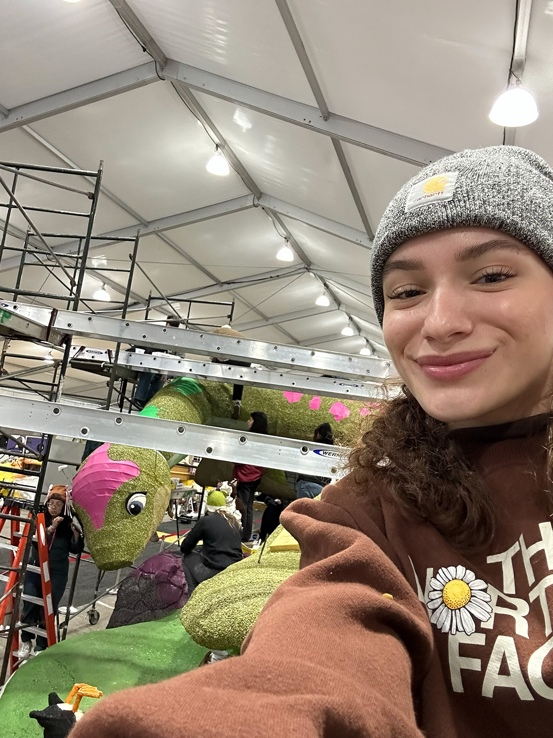 Sofia Perez with Nessie in the background during Rose Float Deco week. 
