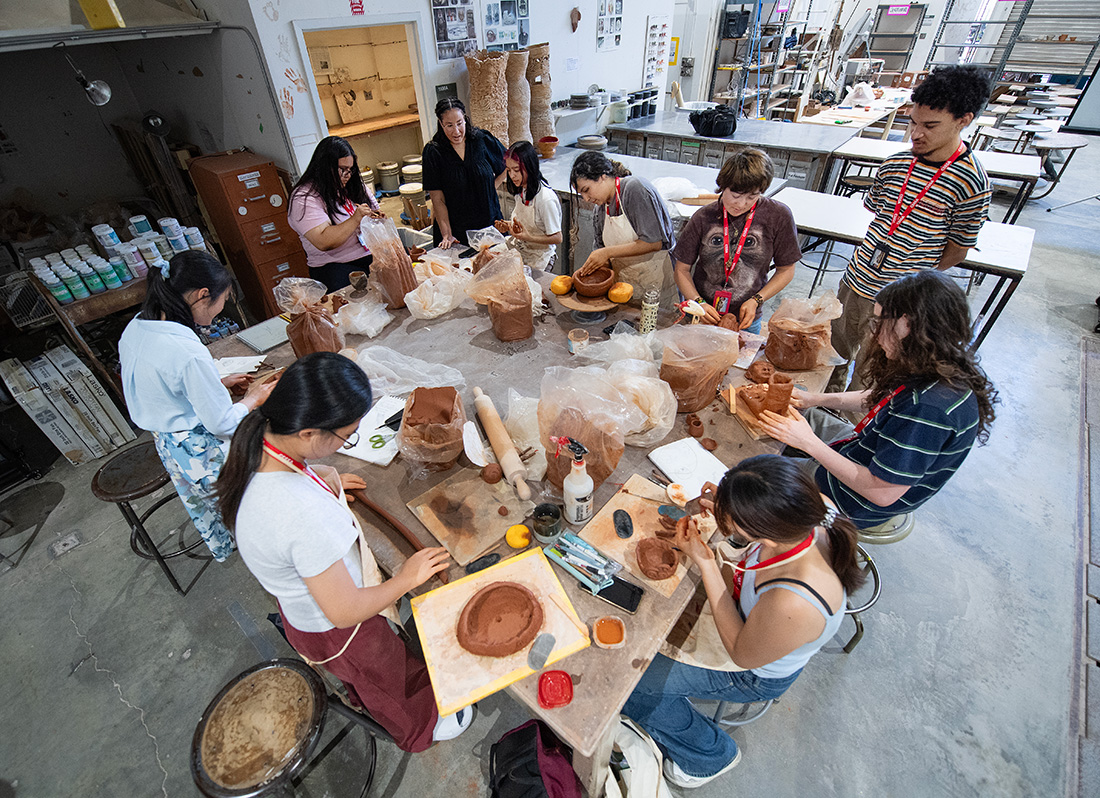 Student participate in a ceramics class.