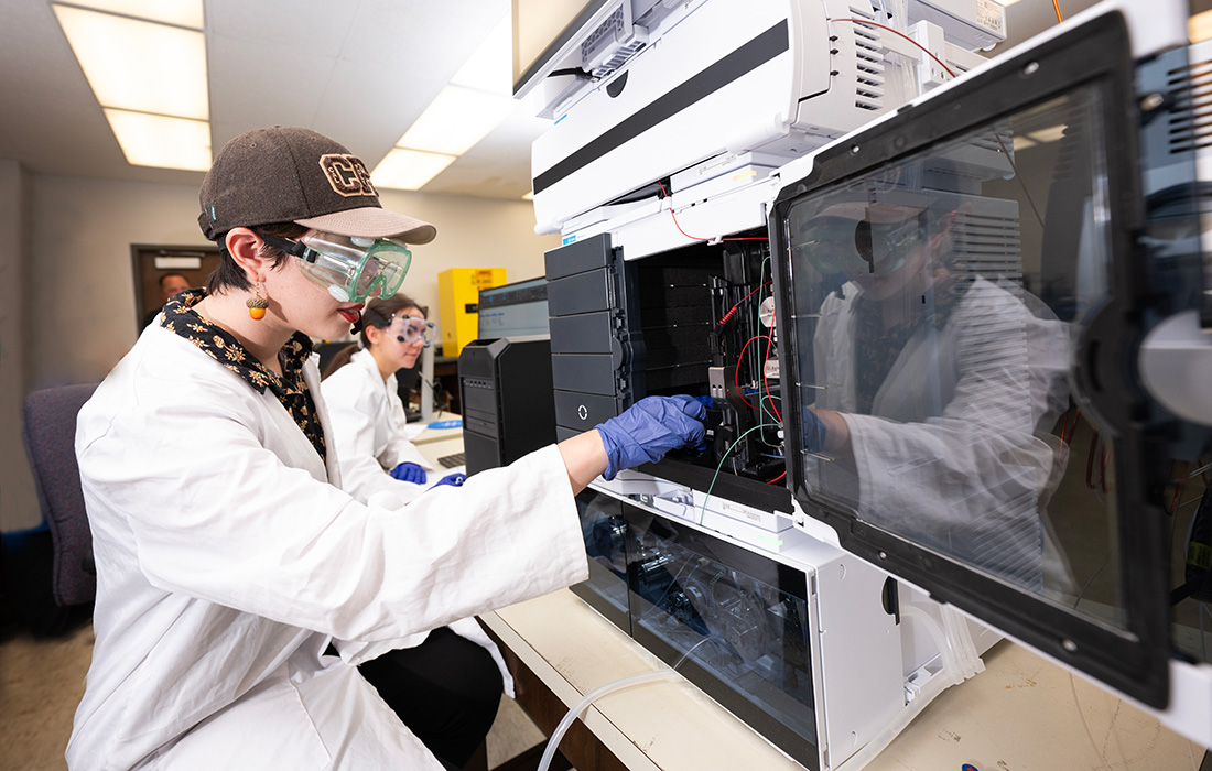 Student works on the Mass Spectrometer at Cal Poly Pomona.