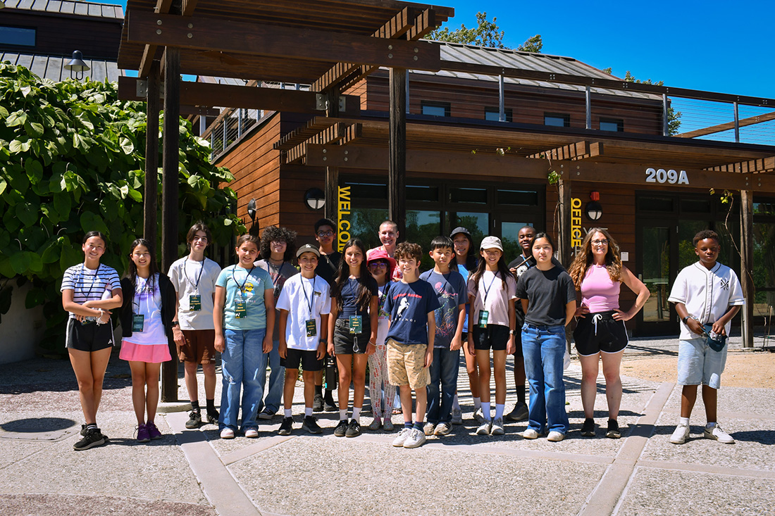 The STEAM cohort pose for a group photo by the Lyle Center.