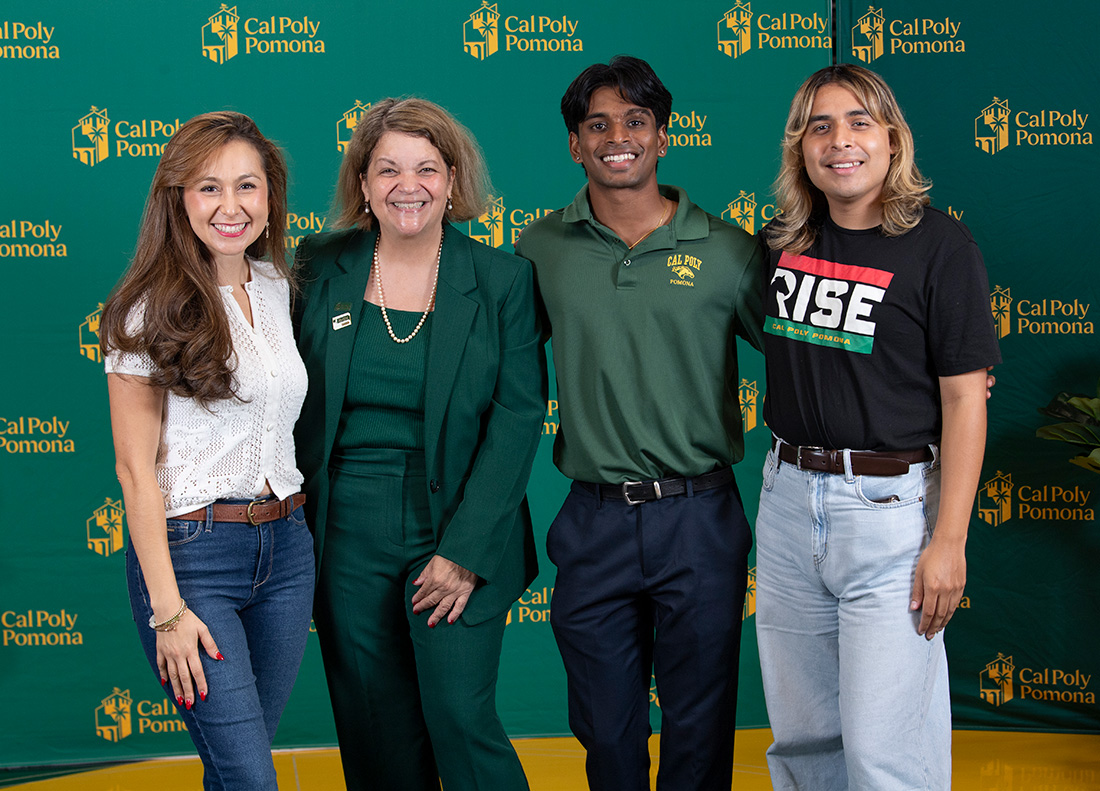 President Vanya poses for a photo with members of the campus comunity.
