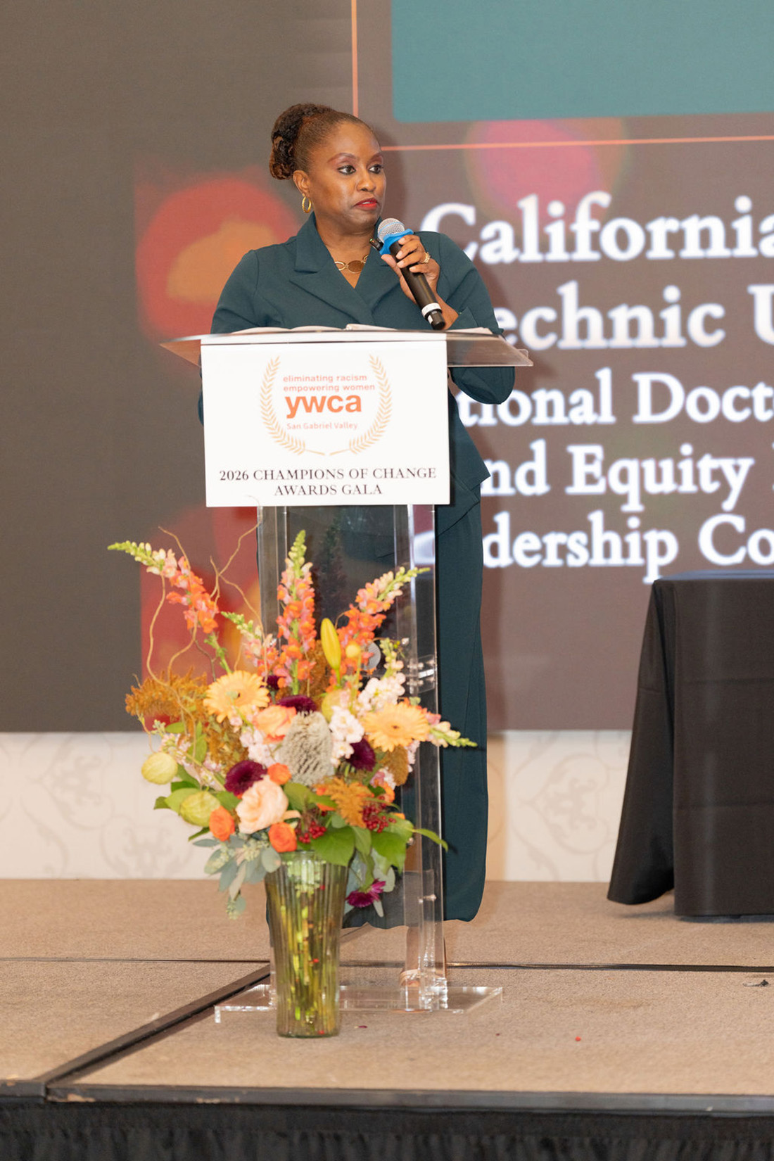 Dean Jenelle Pitt-Parker accepts the award during the Champions of Change award ceremony.