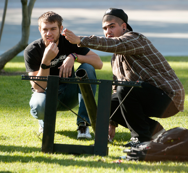 Engineering students test out their tennis ball launcher in the ME233 class on Dec. 2, 2010.