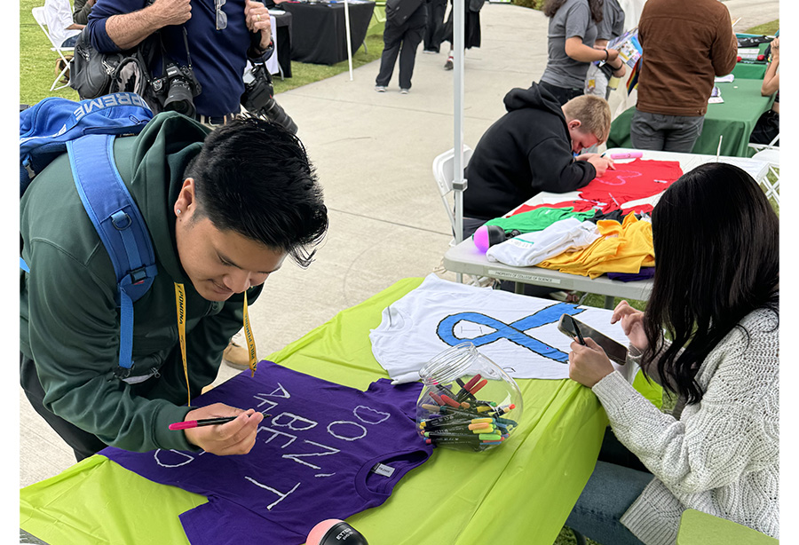 students decorating T-shirts