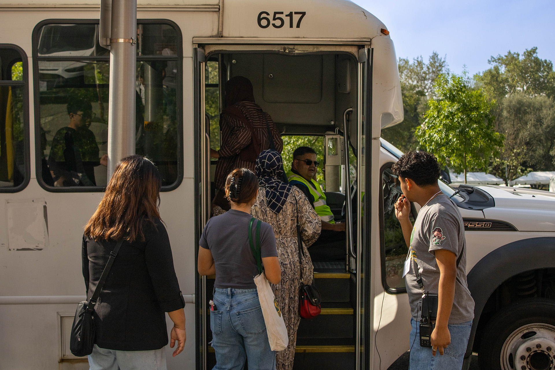 Image of people entering a shuttle