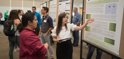 Student presents at an KHC event