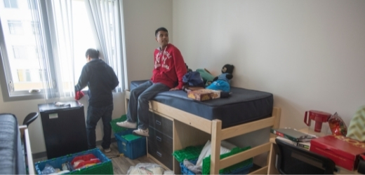 A student settles into his new room