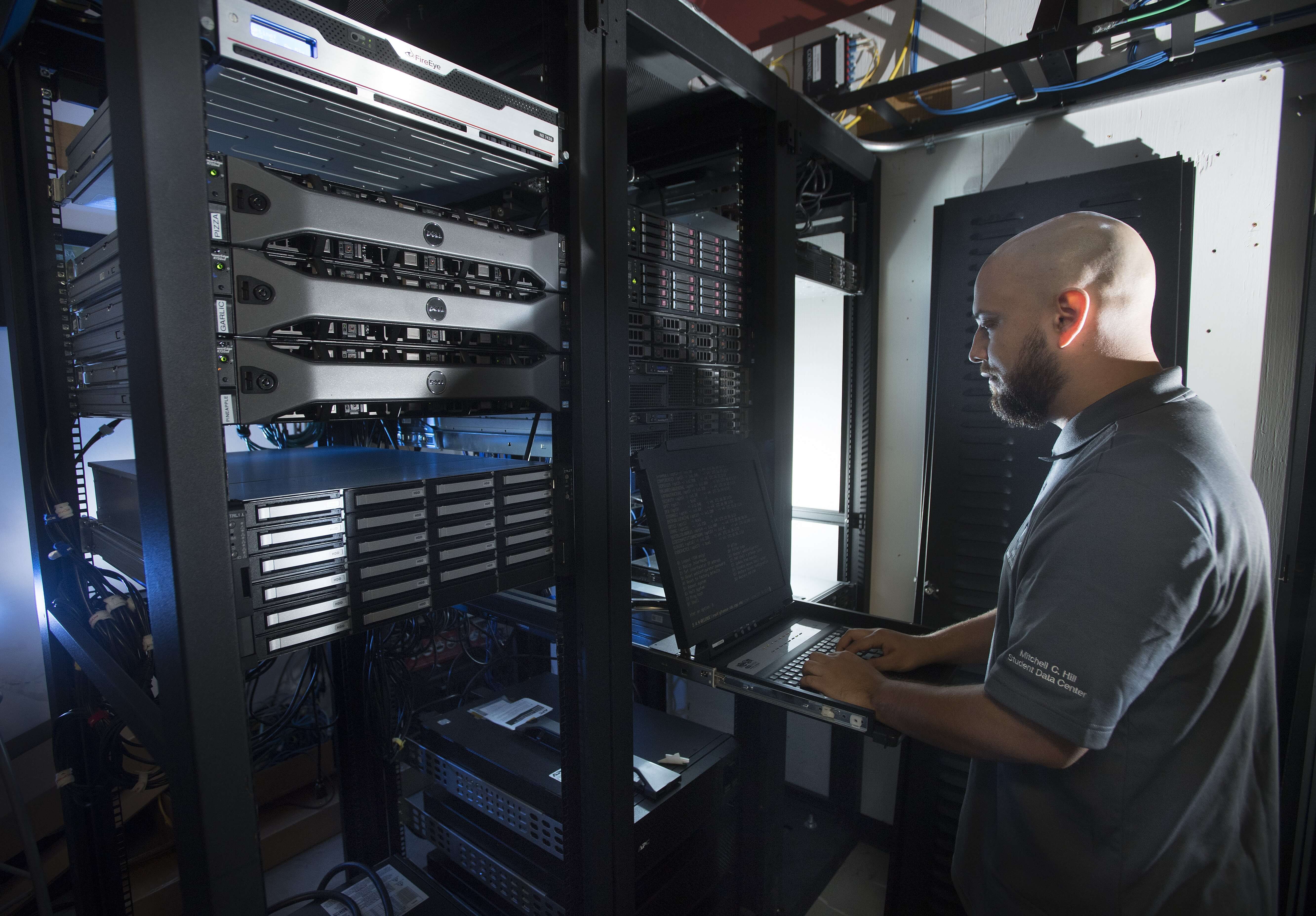 Man working in a computer lab