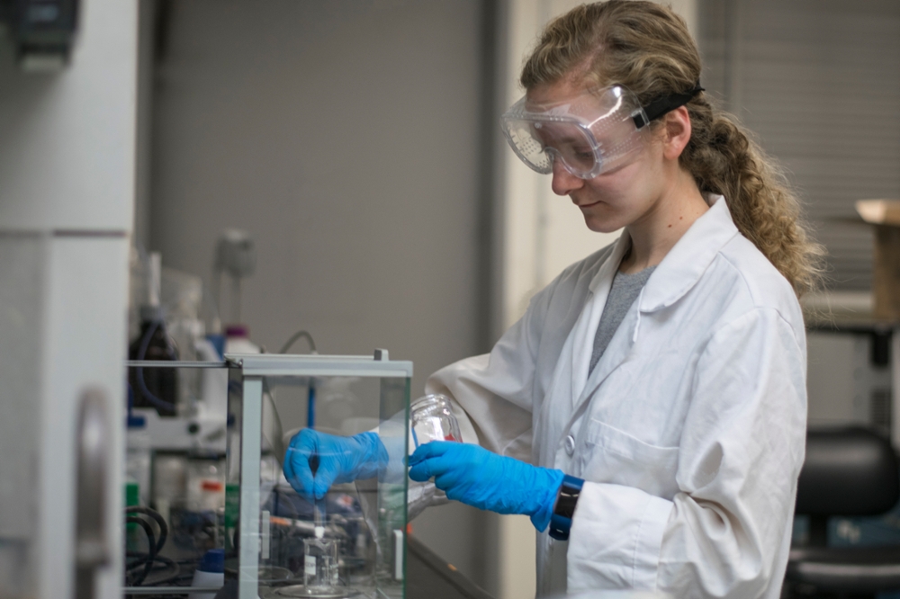 Female student in a lab setting