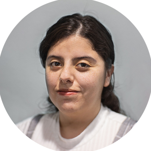 Staff in white shirt smiling