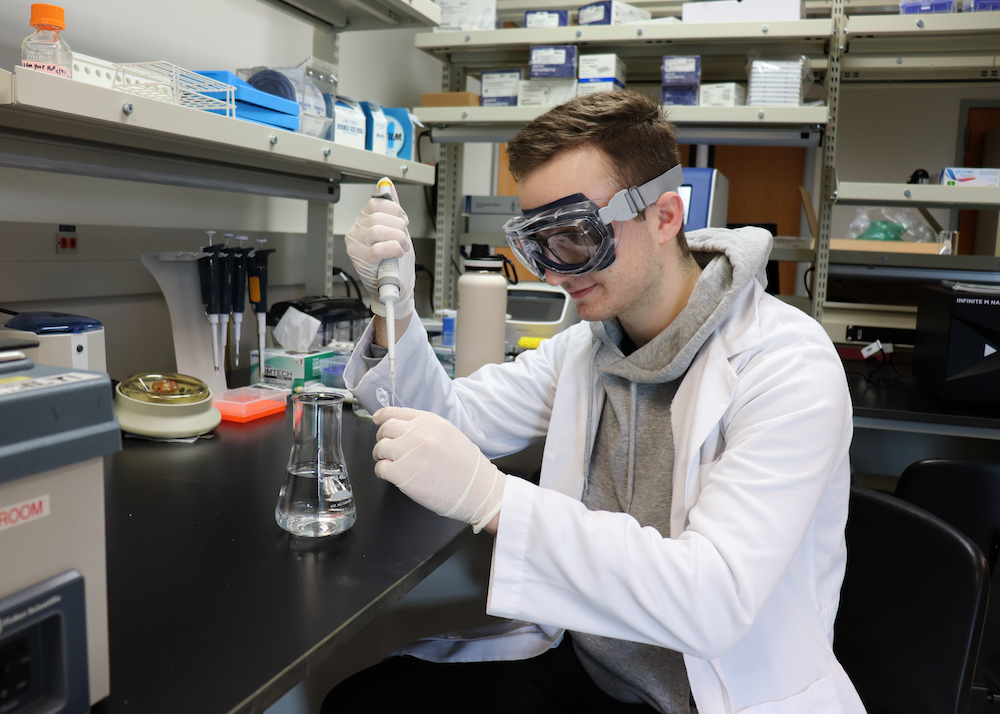 Image of Grigor in a lab setting