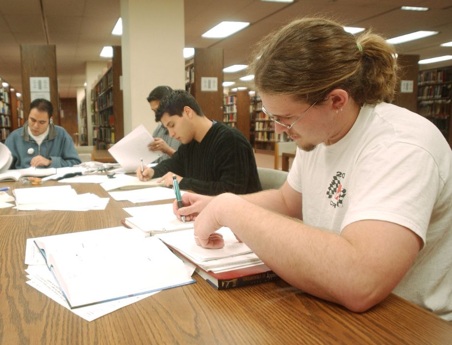 Students studying in the library together.