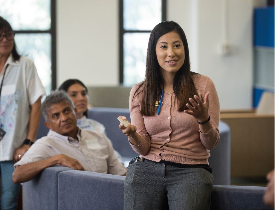 A faculty member leading a discussion.