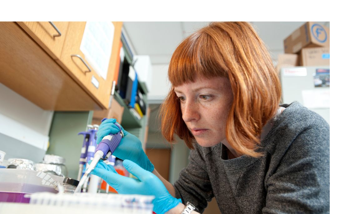 A student conducting research in a lab.