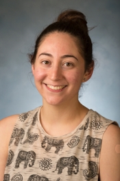 Female student in an elephant print tank top posing