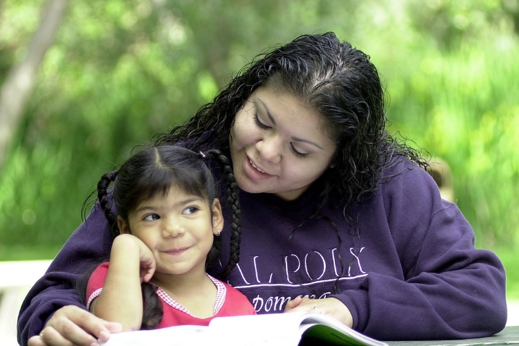 A student reads with her child