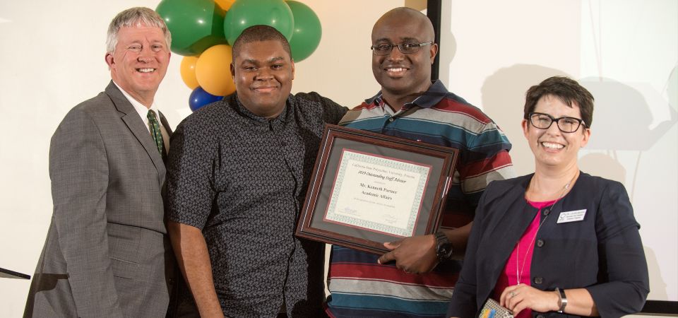 Photo of Joseph Rencis, a student, Kenneth Partner and Laura Massa