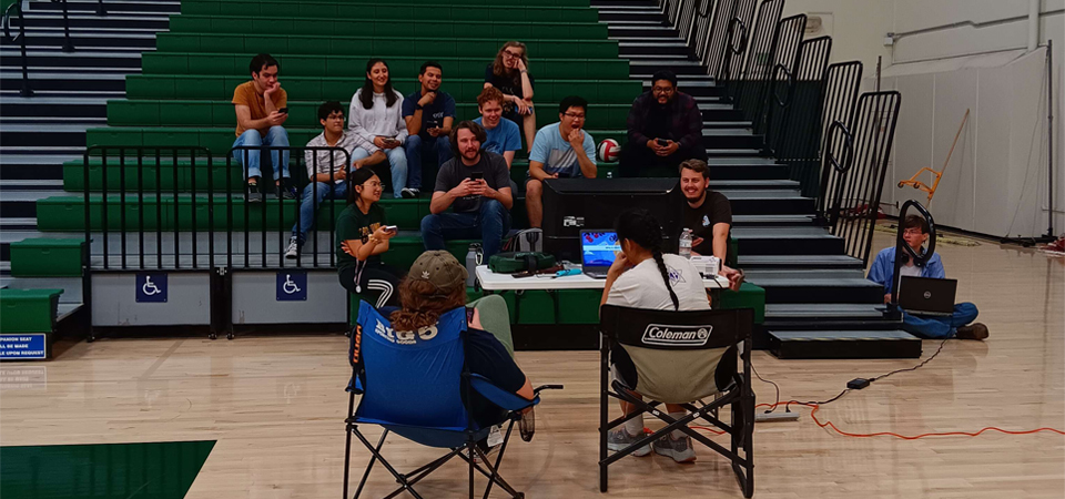 Pep Band members playing games in the gym during Midnight Madness