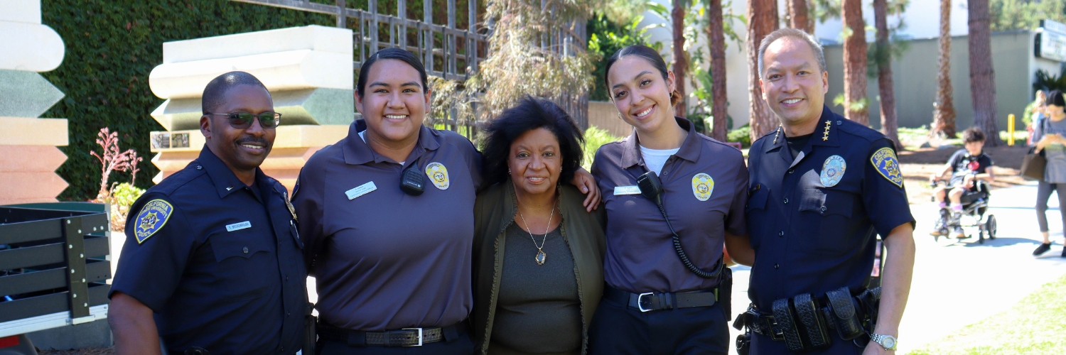 UPD poses with President Coley during a Coffee with a Cop event