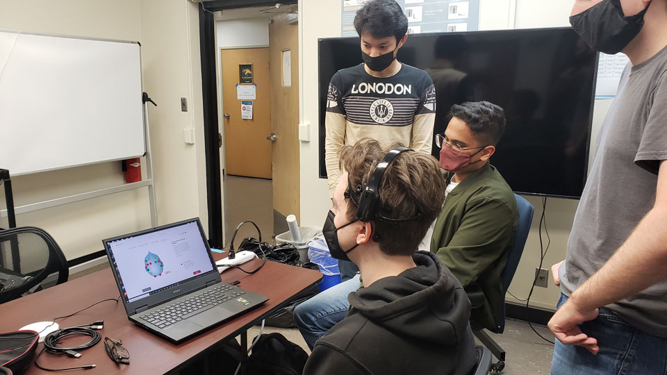 Students working in the PolySec Lab