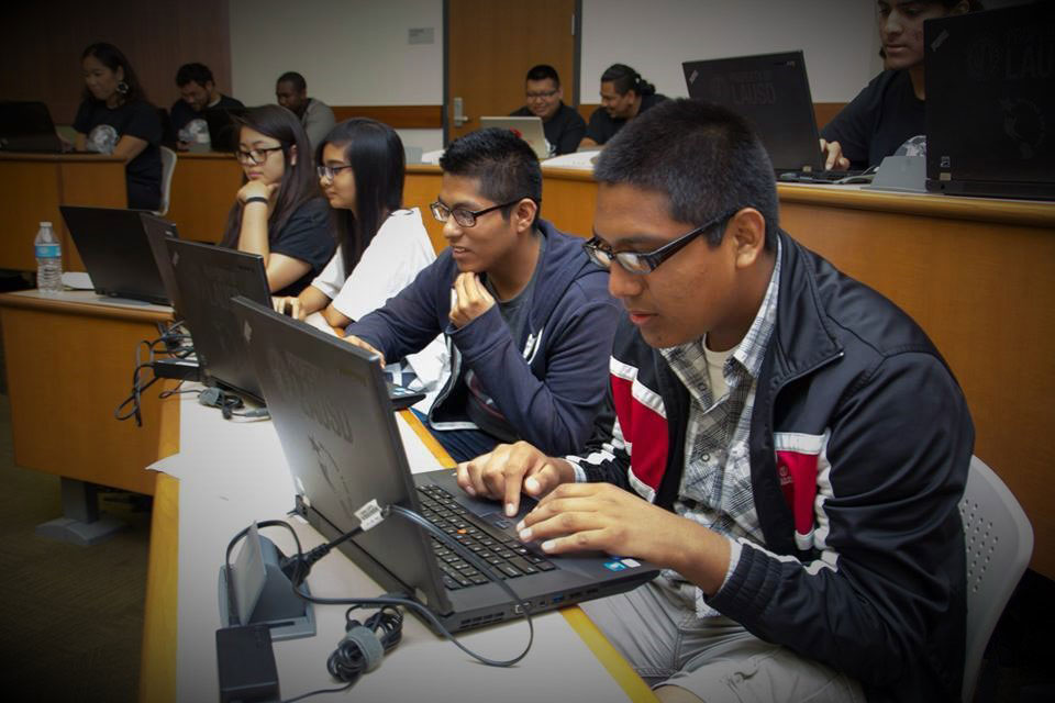 Students work on their laptops