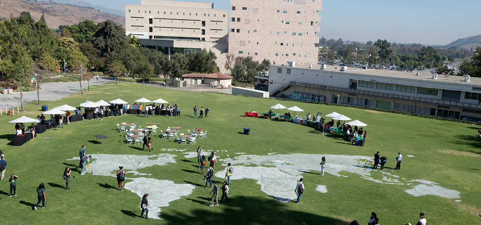 Aerial photo of an international student event with tents on the Engineering meadow