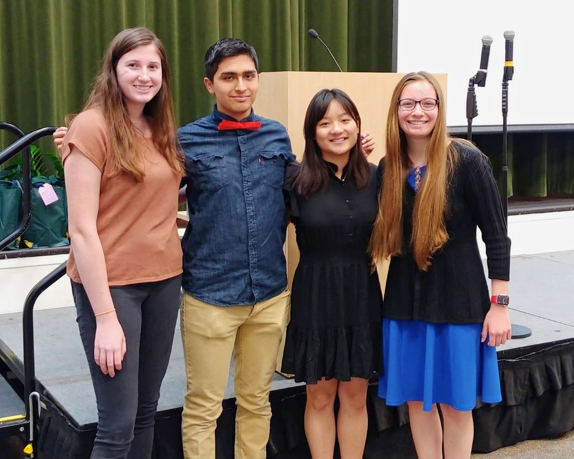 group of PolyX students posing for photos