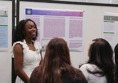 An FYE student presenter, sharing her work with guests at the PolyX FYE Showcase.