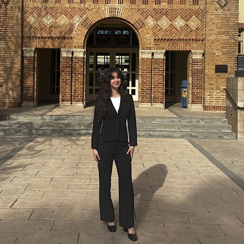 Kiana Jokar in front of brick building