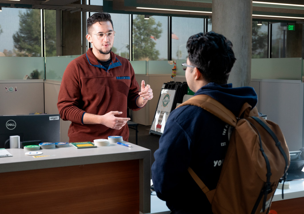 student explaining finance