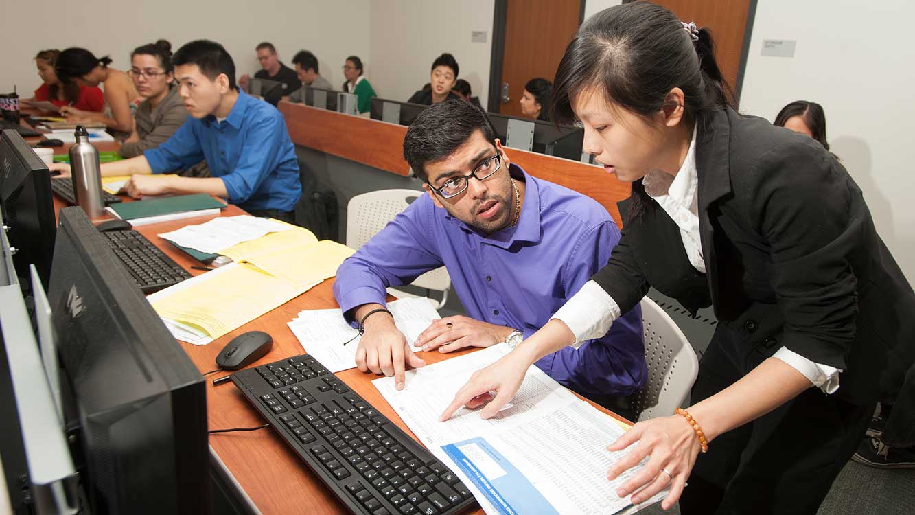 VITA students learning to prepare taxes