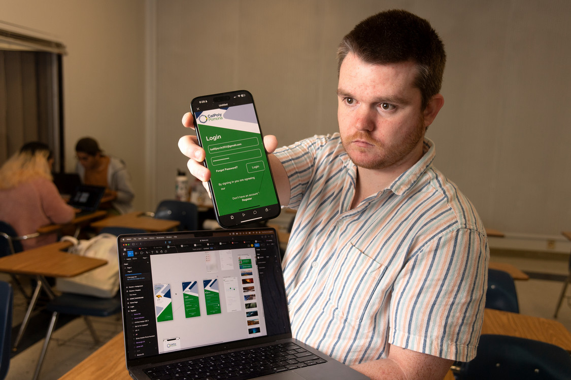 Student showcasing app design for Cal Poly Pomona