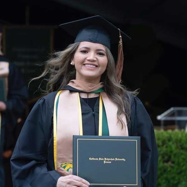 Stephany Soria walking during commencement