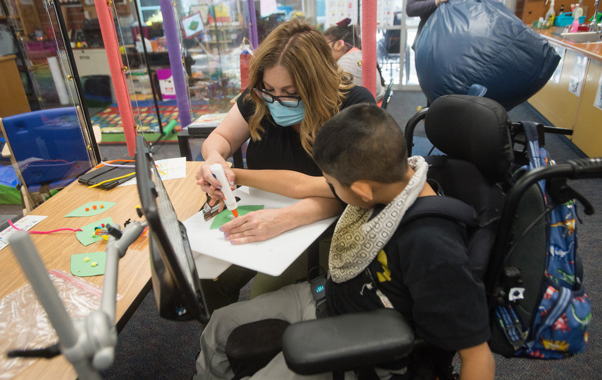 a student getting helped by a student