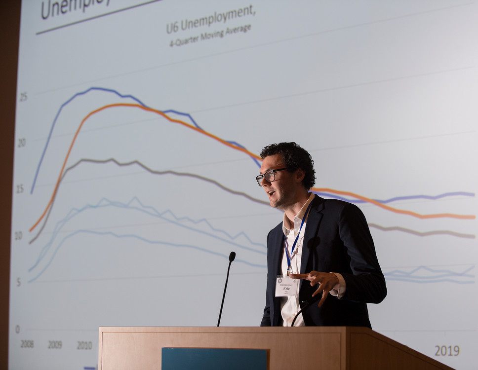 student speaking at a conference