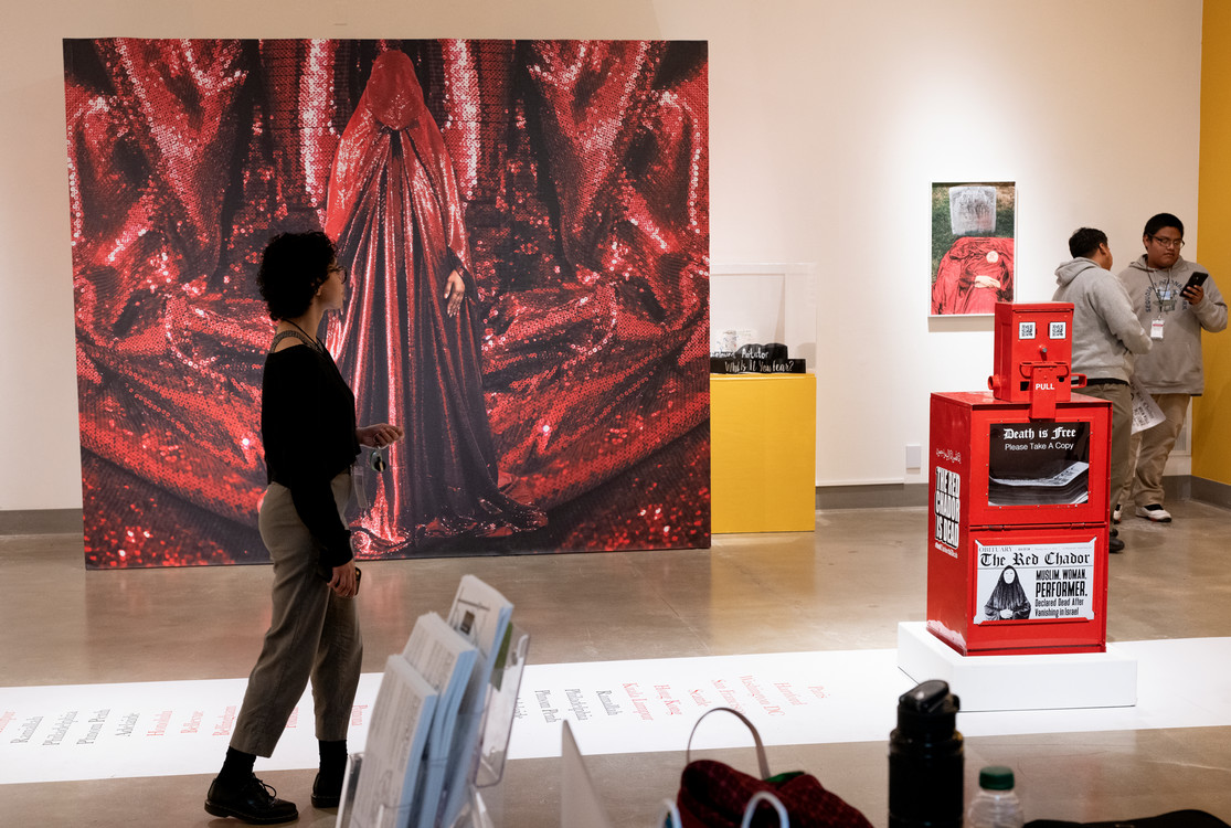 one visitors admire art in the Kellogg Art Gallery