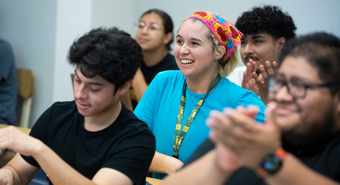 Students smile in Liam Corley's class on the first day of the fall semester.
