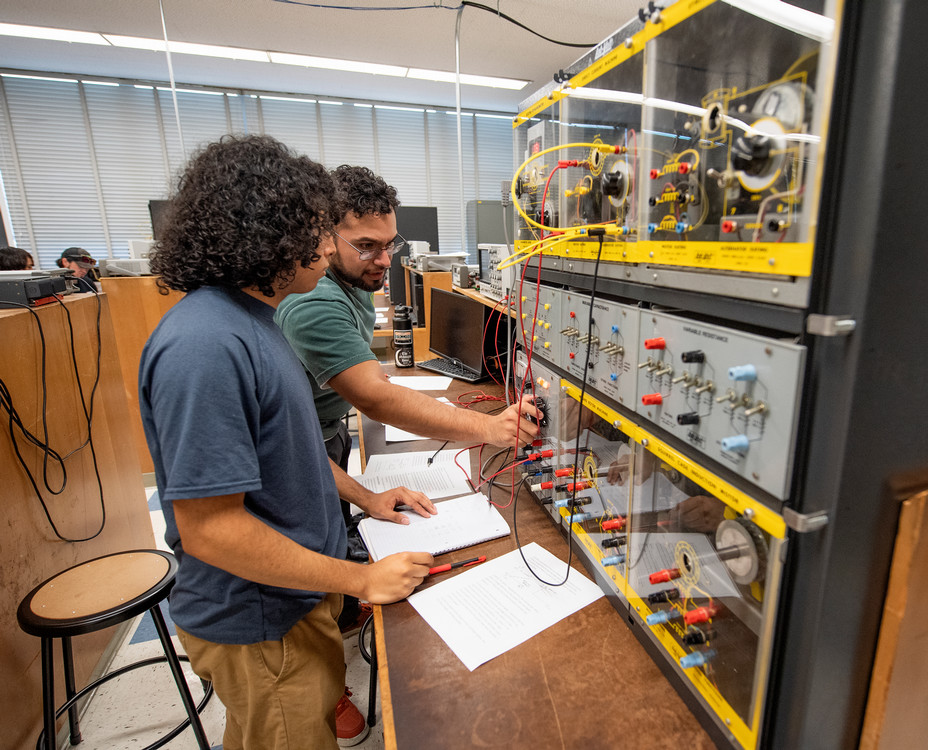 students working with electronics