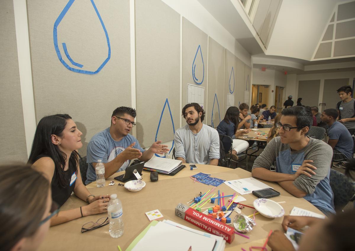 A group of students participate in an idea jam 