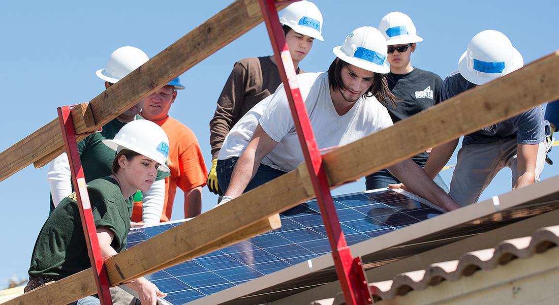 Students install solar panels