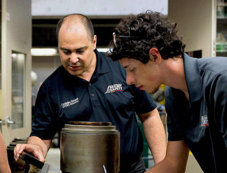 Professor and student doing railway safety